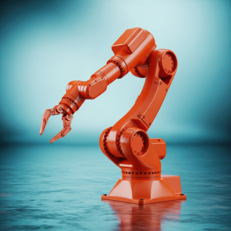 An orange industrial robotic arm with its gripper open is positioned over a shimmering reflective surface, suggesting advanced manufacturing and precision engineering in modern industry.の素材