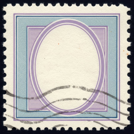 A vintage postage stamp featuring an empty oval space for an image, surrounded by a patterned border, presented isolated on a white background.の素材