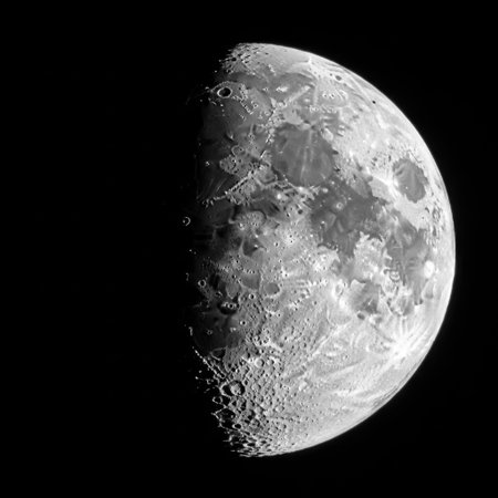 A striking close-up of the moon's surface during its waxing gibbous phase. Craters and lunar landscapes are clearly defined, showcasing the beauty and texture of our celestial neighbor in space.の素材