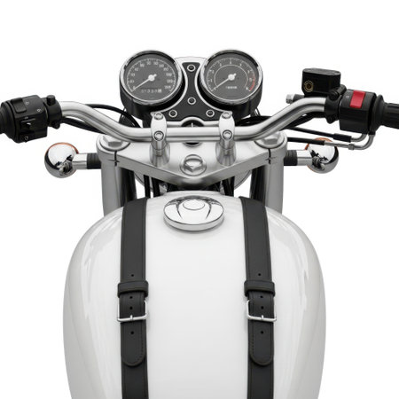 A detailed view of a motorcycle's fuel tank and handlebars, featuring black straps, presented isolated on a white background.の素材