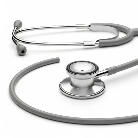 A close-up view of a medical stethoscope, showcasing its gray tubing and silver metal parts, presented isolated on a white background.の素材