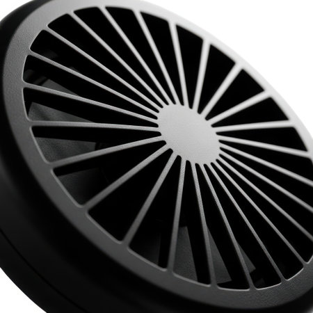 A detailed close-up of a black industrial fan grille with a sunburst pattern of spokes, isolated on a plain white background.の素材