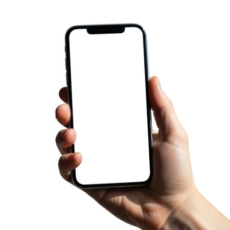 A person's hand is holding a contemporary smartphone with a clear white screen, isolated on a plain white background.の素材