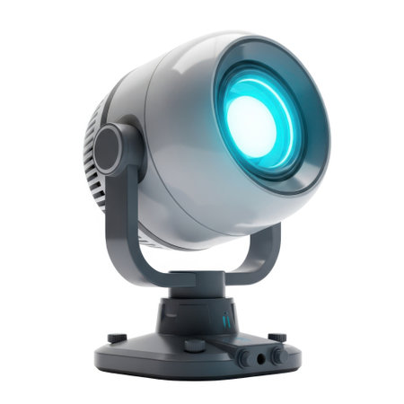 A single gray spotlight with a bright blue light is positioned on a white background.の素材