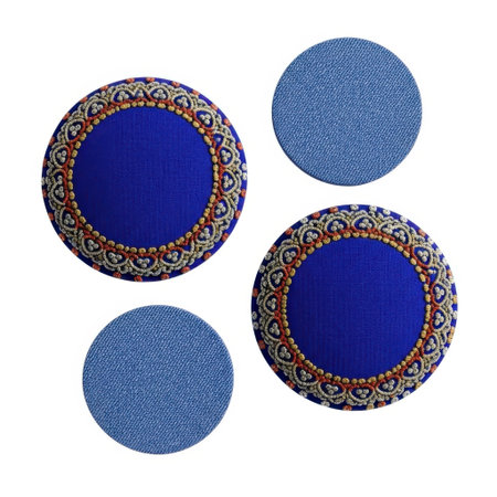 A set of four uniquely designed round pillows featuring vibrant colors and intricate embroidered patterns. These decorative accents add a touch of artistry and comfort to any living space or home decor.の素材
