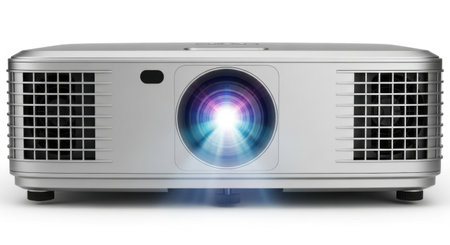 A front view of a sleek, silver digital projector emitting a bright, colorful light beam, presented on a clean white background.の素材
