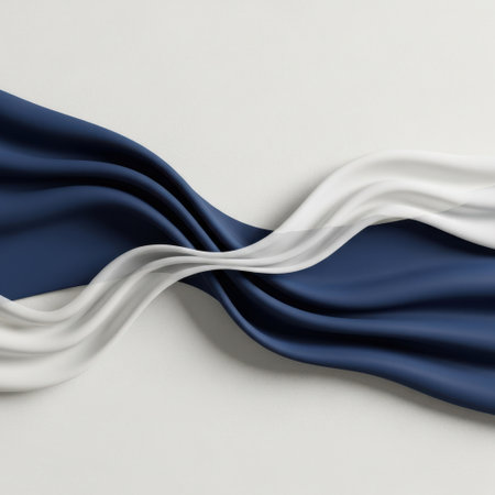 A luxurious close-up of smooth blue and white fabric gracefully draped in flowing wave-like patterns. The material displays a soft texture with subtle lighting, creating a sophisticated and elegant visual.の素材