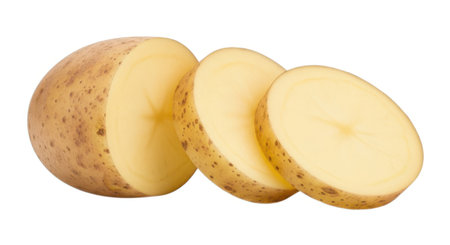A whole potato is partially sliced revealing its creamy interior. The image highlights the natural texture and golden-brown skin, perfect for culinary inspiration or food-related content.の素材