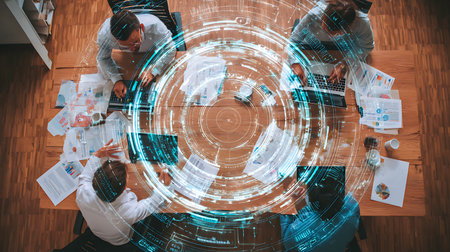 Diverse team collaborating around a table with digital data overlay