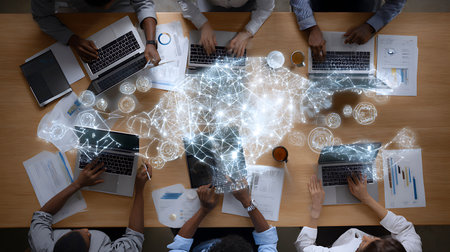 Diverse team collaborating on a project with digital data overlay