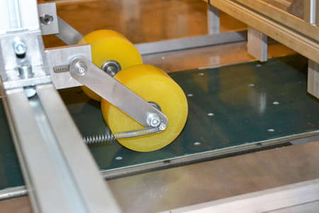 Mechanical system, wheel, roller, conveyor belt, conveyor