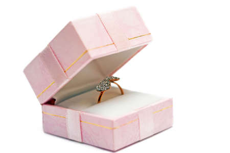 A wedding ring in the package on a white backgroundの写真素材