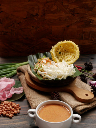 Selective focus of Asinan Betawi. The vegetable asinan of the Betawi people from Jakarta is preserved Chinese cabbage, cabbage, bean sprouts and tofu served with peanut sauceの写真素材