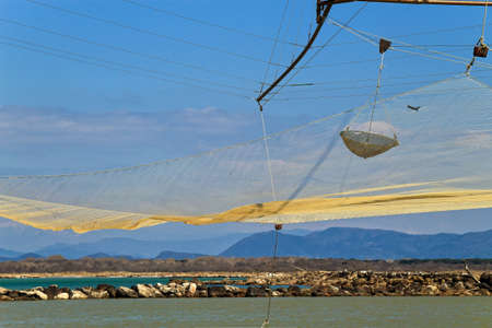 barbell fishing at the Arno mouthの写真素材
