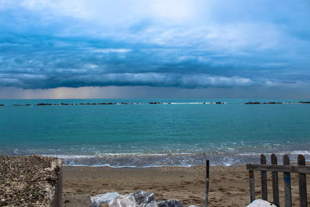 Stormy sunset on the seaの写真素材
