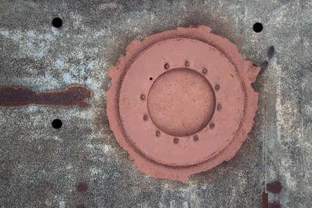 rusty sheet with manholeの写真素材