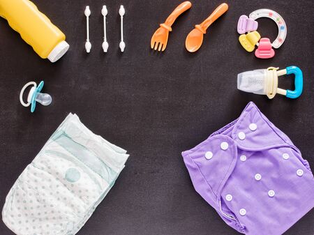 Baby set of cloth diaper, disposable diaper, baby powder, tither, cotton buds, spoons, soother and...