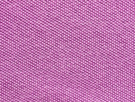 purple knitted Jersey polo texture as textile backgroundの写真素材