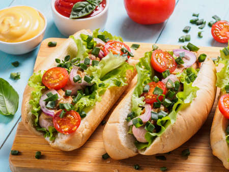 homemade hotdogs with chicken, sausages, vegetableの写真素材