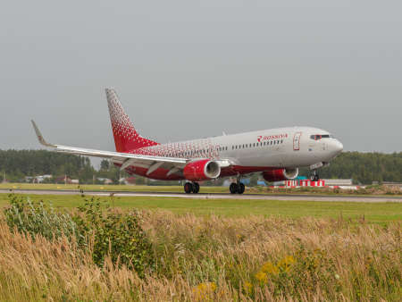 Nizhny Novgorod, Russia - August 23, 2017: Boing 737 airliner is landing on the runway of the airport Strigino.のeditorial素材