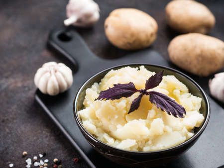 Mashed potatoes on dark concrete backgroundの写真素材