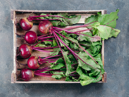 Beet, beetroot bunch on dark background, copy spaceの写真素材