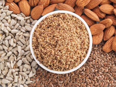 Homemade LSA mix in plate - Linseed or flax seeds, Sunflower seeds and Almonds. Traditional...