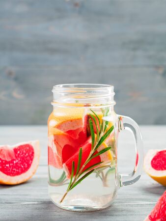 infused detox water with grapefruit and rosemaryの写真素材