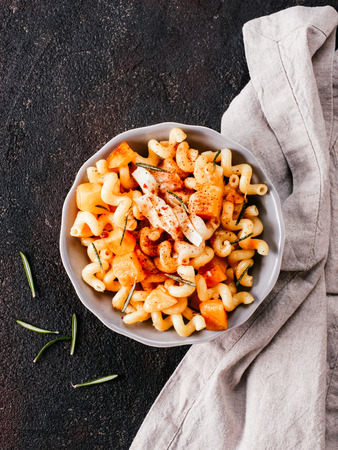 Fusilli pasta with pumpkin, rosemary and brieの写真素材