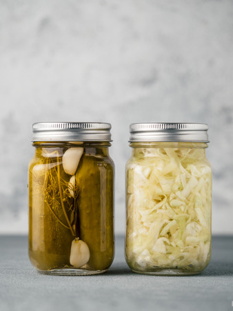 Glass jar with pickled cucumbers, copy spaceの写真素材