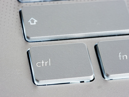 Ctrl - Control key on silver laptop keyboard