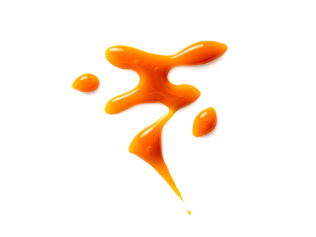 sweet caramel sauce isolated on white background Top view or flat lay.の写真素材
