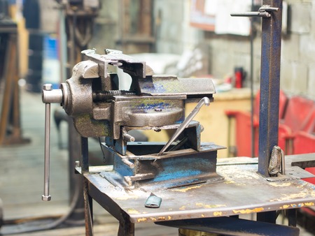 Mechanical vise in workshopの写真素材