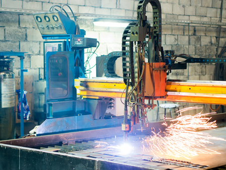 High precision CNC gas or plasma cutting metal sheet. Metal sheet and working plasma or gas plasma...