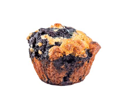 Homemade vegan blueberry muffin isolated. Vegetarian egg-free muffin with blue berries isolated on whte with clipping path.の写真素材