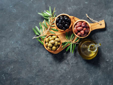 Set of different types olives and olive oilの写真素材