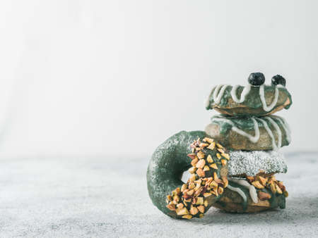 Vegan donuts topped spirulina glazeの写真素材