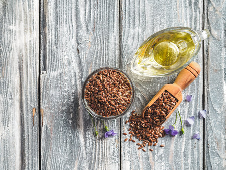 Flax seeds and flaxseed oil, copy space, top viewの写真素材