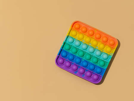 Popular silicone colorful antis tress  toy for child. Top view. Simple dimple. Bright light with hard shadowsの写真素材