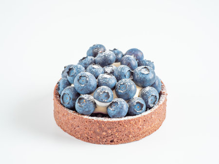 Blueberries mini tart on transparent white background. Fresh blueberry tart as summer food concept isolated on transparent backgroundの写真素材