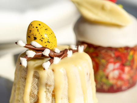 Traditional Easter cottage cheese dessert Paskha decorated with quail eggs and chocolate willow on...