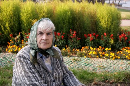 Portrait of the elderly woman in a scarfの写真素材