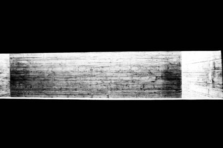close up of a concrete wall with an illuminated illuminated black and white photo with strong...