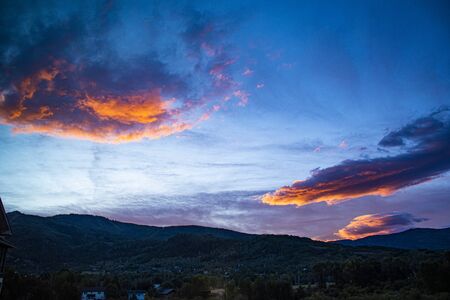 Wonderful sunrise from the window of a hotel in Steamboat Colorado on a late summer dayの写真素材