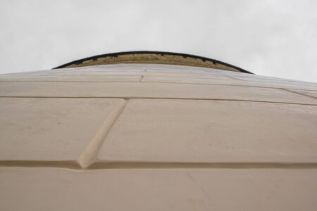 close up of the wall painted with blue sky and cornice of building in Possagno, Treviso, Italyの写真素材
