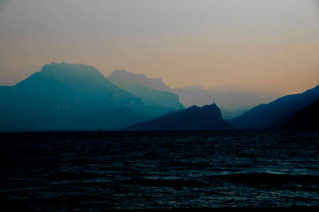 image of Lake Garda in the early morning in the province of Verona, Italyの写真素材