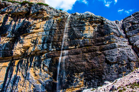 beautiful and majestic waterfall of Val Travenanzes in the Dolomites of Cortina D'ampezzo in Belluno, Veneto, Italyの写真素材