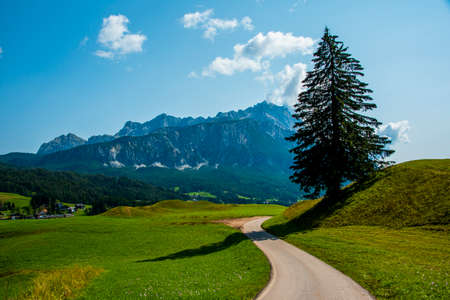 the peaks of the dolomites covered by clouds around the town of Cortina D'Ampezzo, Belluno, Italyの写真素材