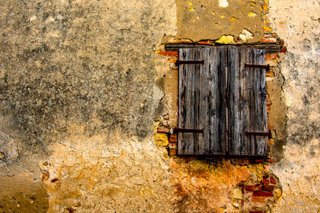old grunge wooden window, in Vicenza, Italyの写真素材