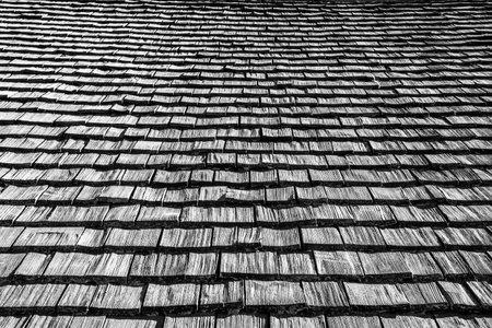 typical roof of the Zoldo valley with larch wood tiles on the Zoldo valley, Belluno, Italyの写真素材